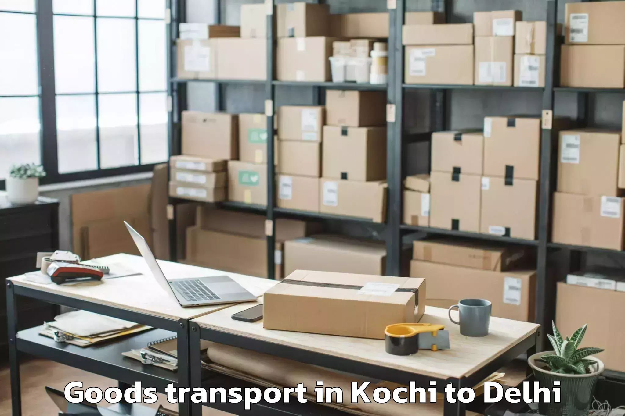 Book Kochi to Defence Colony Goods Transport Online